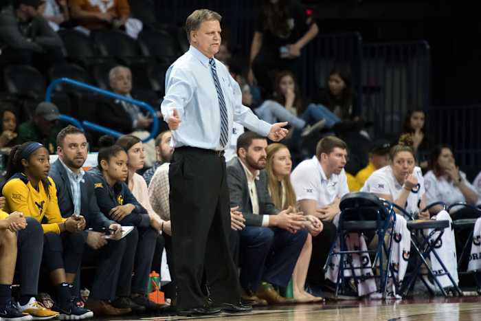 West Virginia Mountaineers head coach Mike Carey reacts during the game against the Texas Longhorns during the women's Big 12 Conference Tournament at Chesapeake Energy Arena